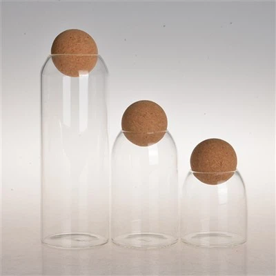 Sklenená nádoba s dreveným viečkom